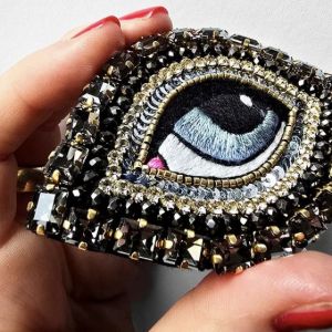 SPILLA OCCHIO STRASS GRIGIO